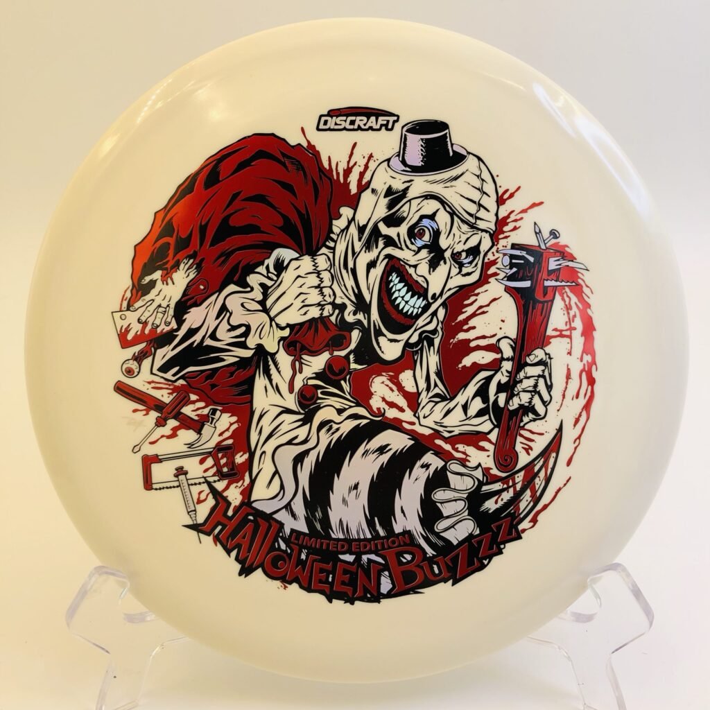 Translucent Glo Discraft Buzzz in the 2025 Halloween Buzzzifier edition with vibrant tri-foil stamp.