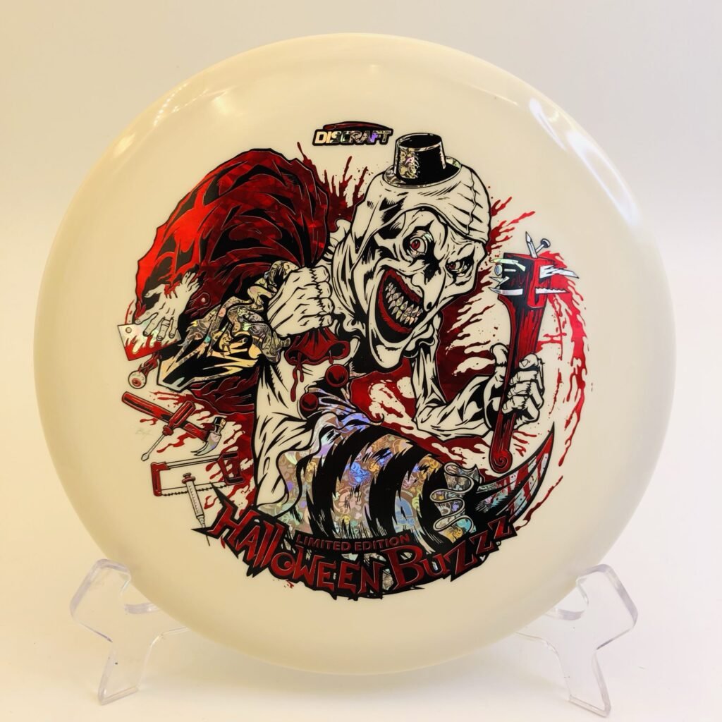 Discraft Buzzz in Glo plastic 2025 Halloween Special Edition with tri-foil stamp.