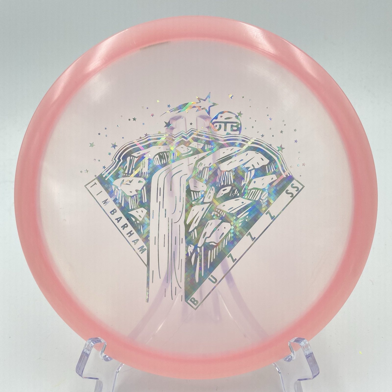 Top view of bright Z Glo Discraft Buzzz SS in Z Glo plastic featuring a vibrant glow for night throws.