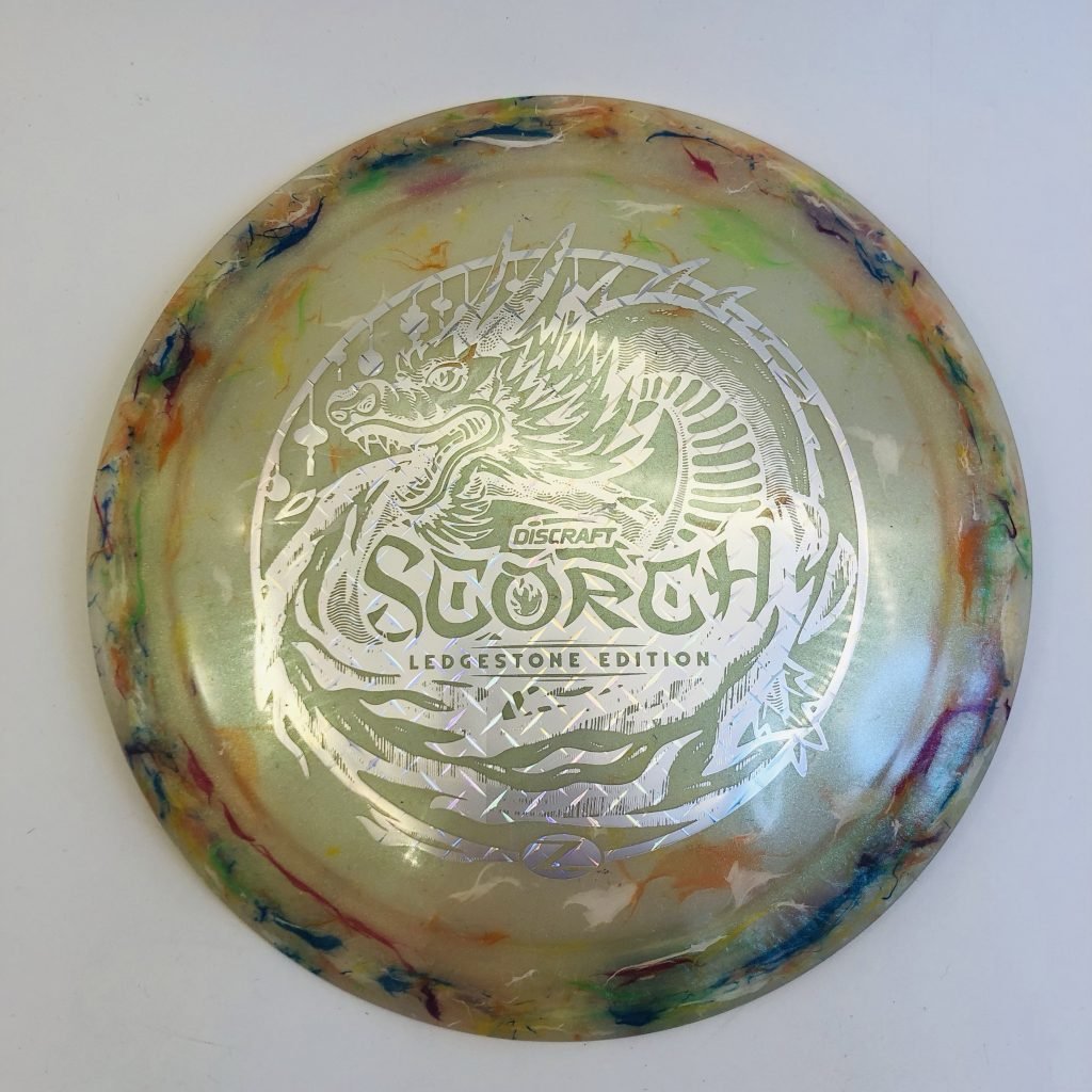 Translucent multi-color Discraft Jawbreaker Z FLX Scorch - 2026 Ledgestone Edition with vibrant color shift.