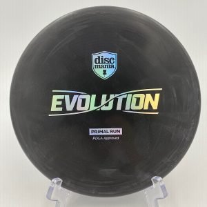 Top view of bright yellow Discmania Soft Exo Tactic in Primal Run plastic for enhanced grip and control.