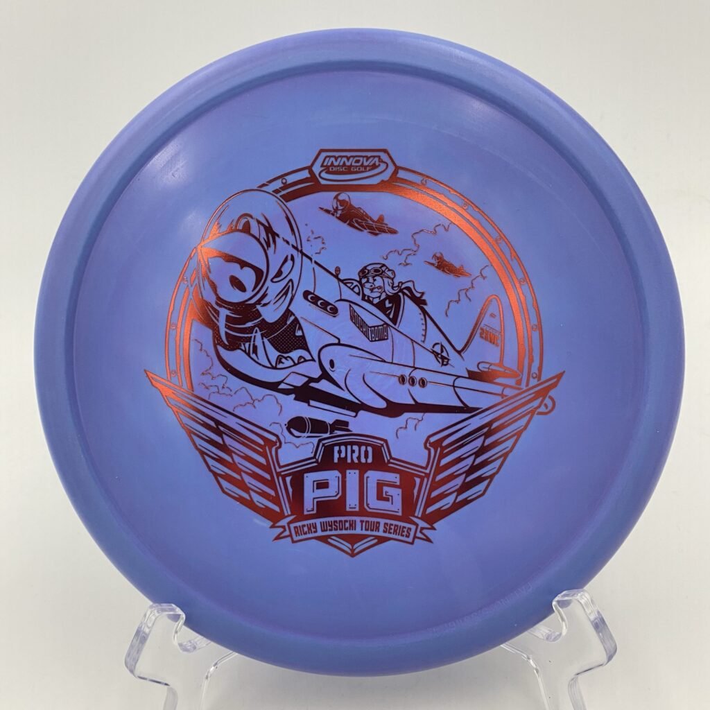 Top view of glowing green Innova Pig in Glow Pro plastic - 2021 Ricky Wysocki Tour Series.